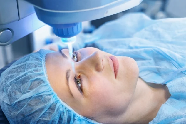 Patient under a laser vision correction system